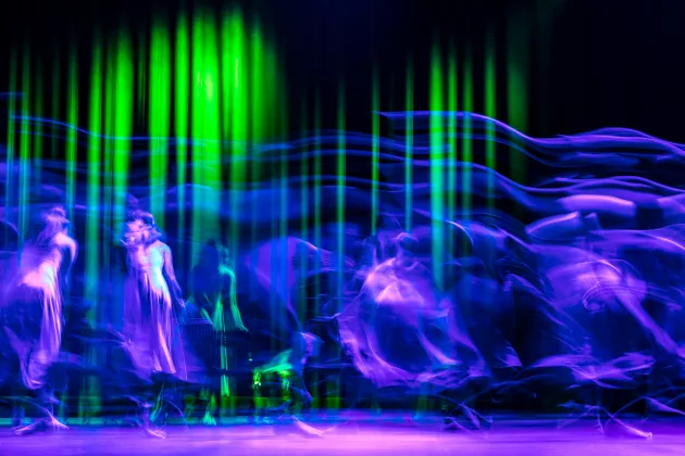hulki-okan-tabak-t0WFxtrUgSc-unsplash (002).jpg Dancing people on an illuminated scene. Photo.