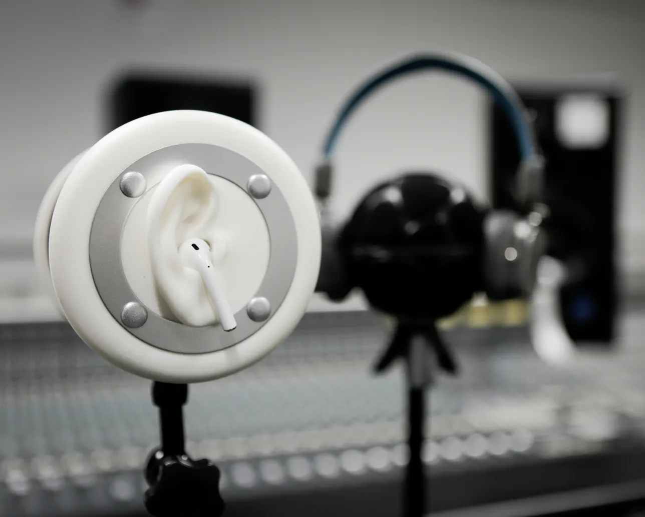Sound device with year shape and yearphones. Photo.